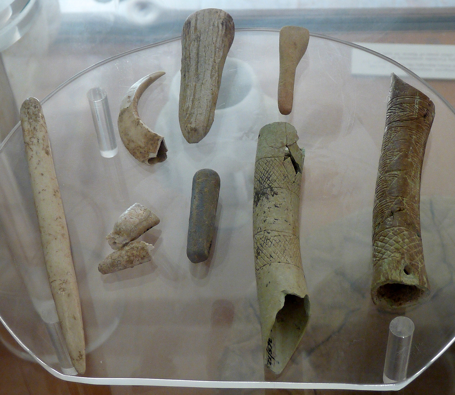 cycladic decorated bone tubes containing pigments